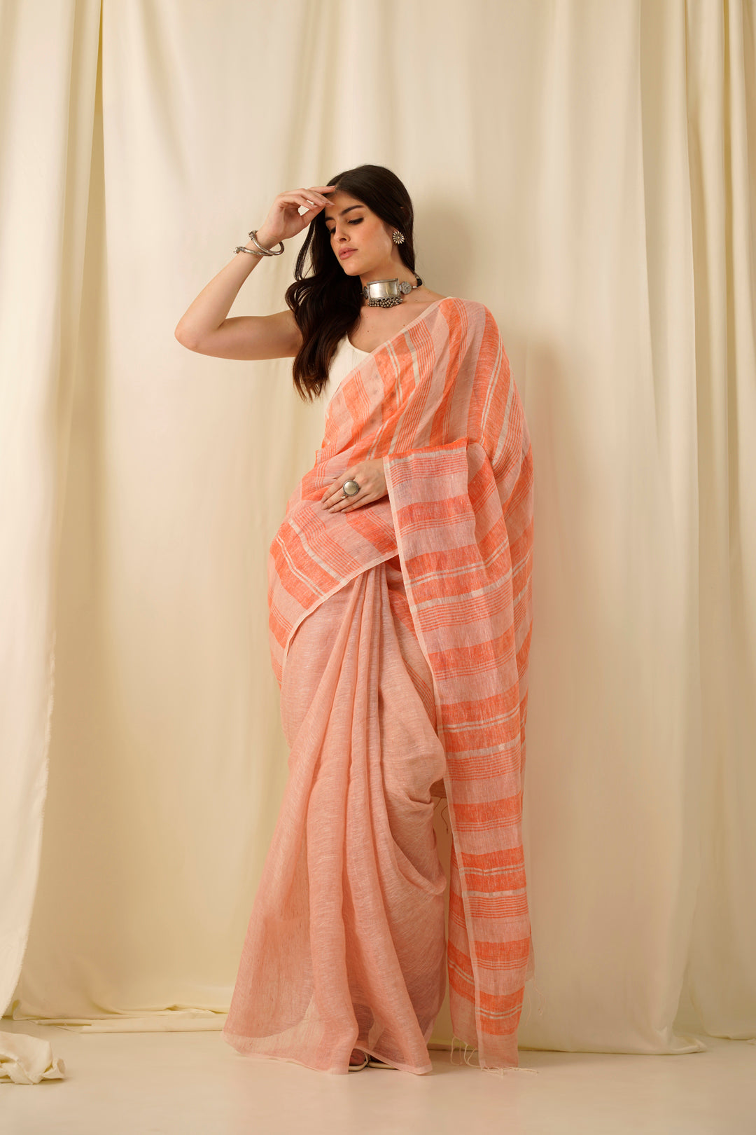 Chaitanya- The Peach Stripe Linen Saree