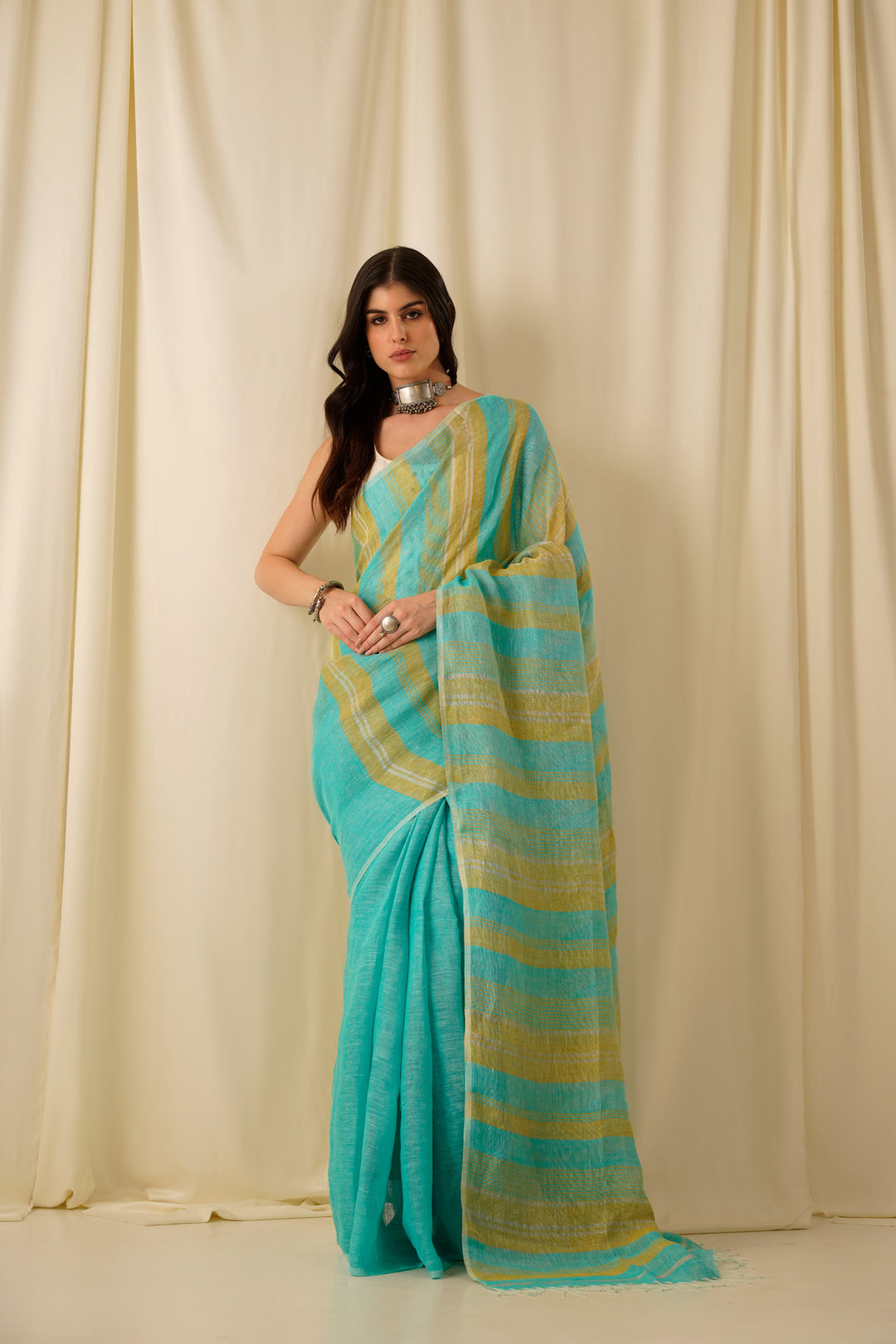 Nitya- The Firozi Stripe Linen Saree